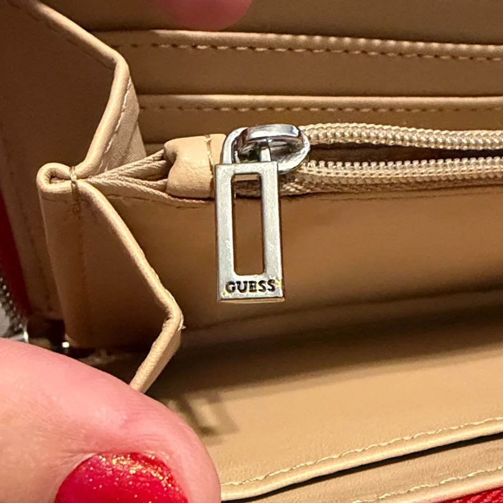 Guess features embossed